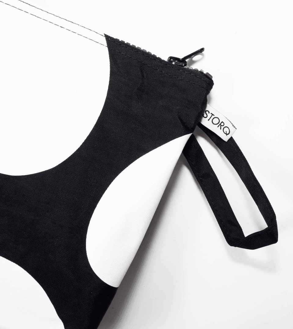 Cover for Storq showing a close-up of a bag