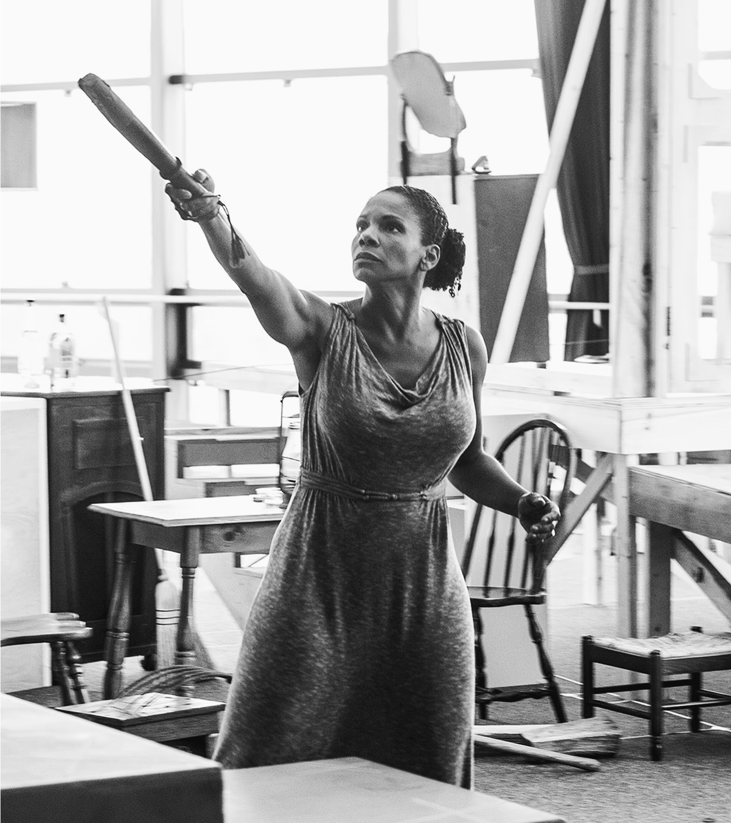 A black and white photo of Audra Mcdonald actress rehearsing a scene