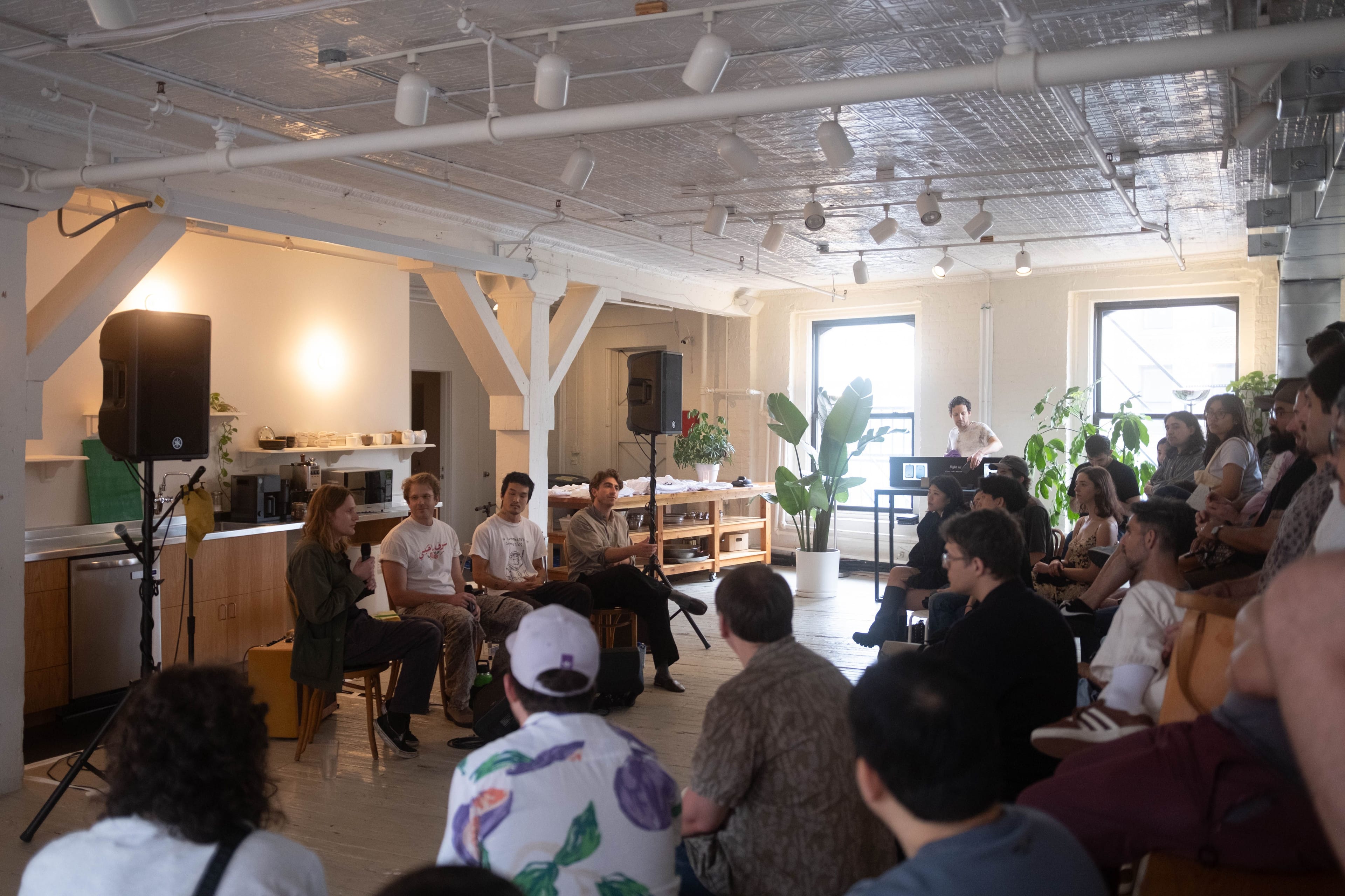 Light co-founder Joe Hollier in conversation with Sanctuary Computer developers in front of a seated audience at the Index studio.