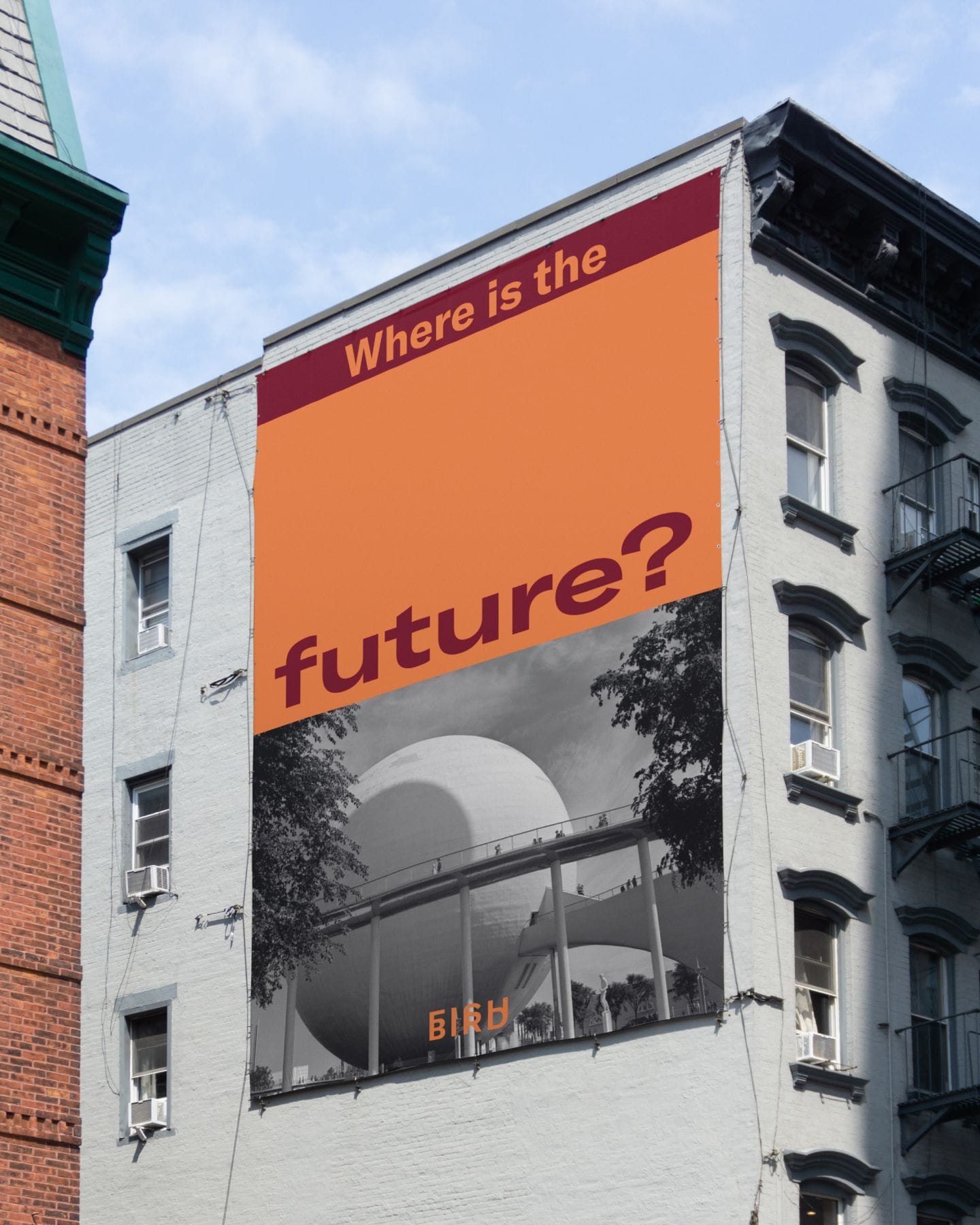 Mockup of a Fishbird billboard reading ‘Where is the future?’ mounted on the side of a New York apartment building.