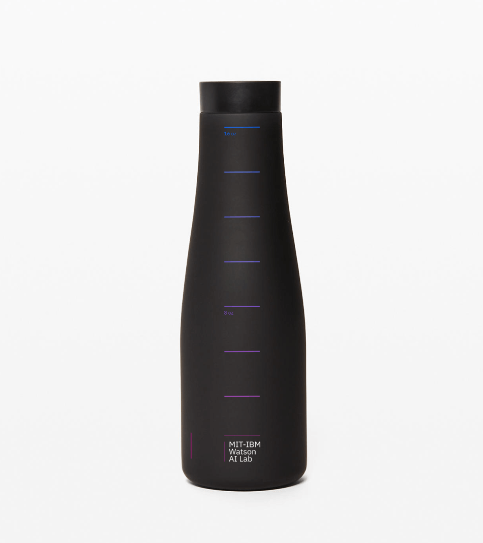 Branded MIT-IBM Watson AI Lab water bottle, matte black with the brand bars and wordmark in a blue-to-magenta gradient.